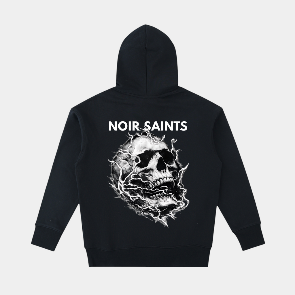 NOIR SAINTS Canada heavyweight black cotton oversized hoodie featuring a bold white skull graphic on the back.