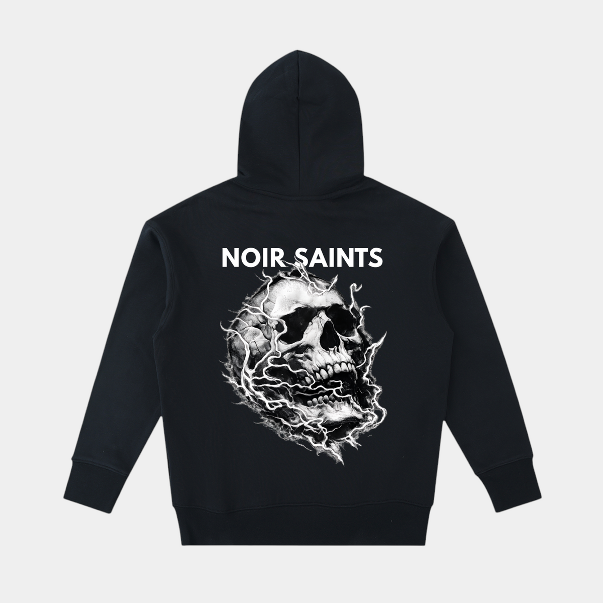 NOIR SAINTS Canada heavyweight black cotton oversized hoodie featuring a bold white skull graphic on the back.